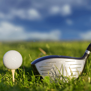 A golf ball and golf club